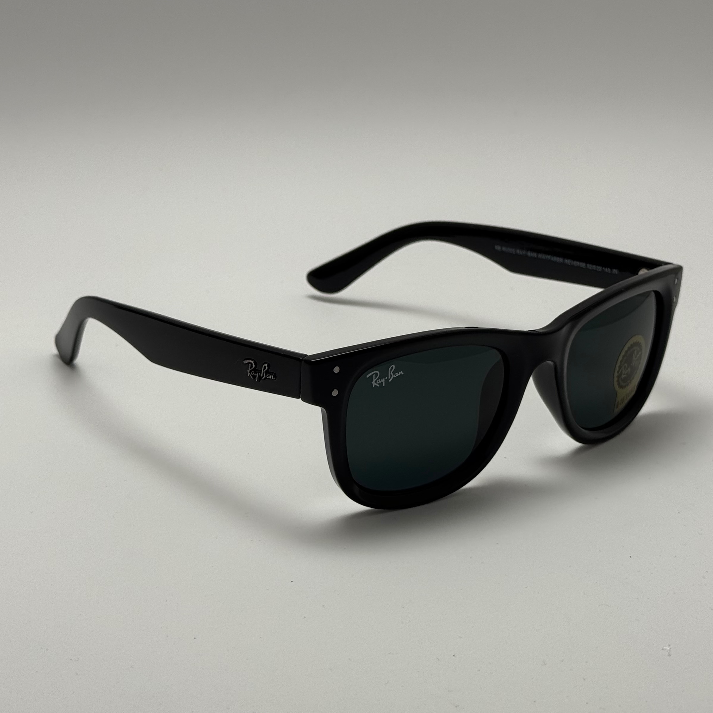 عینک آفتابی ریبن ویفرر شیشه سنگ تمام مشکی به همراه پک کامل ریبن Rayban WAYFARER RB 0502S