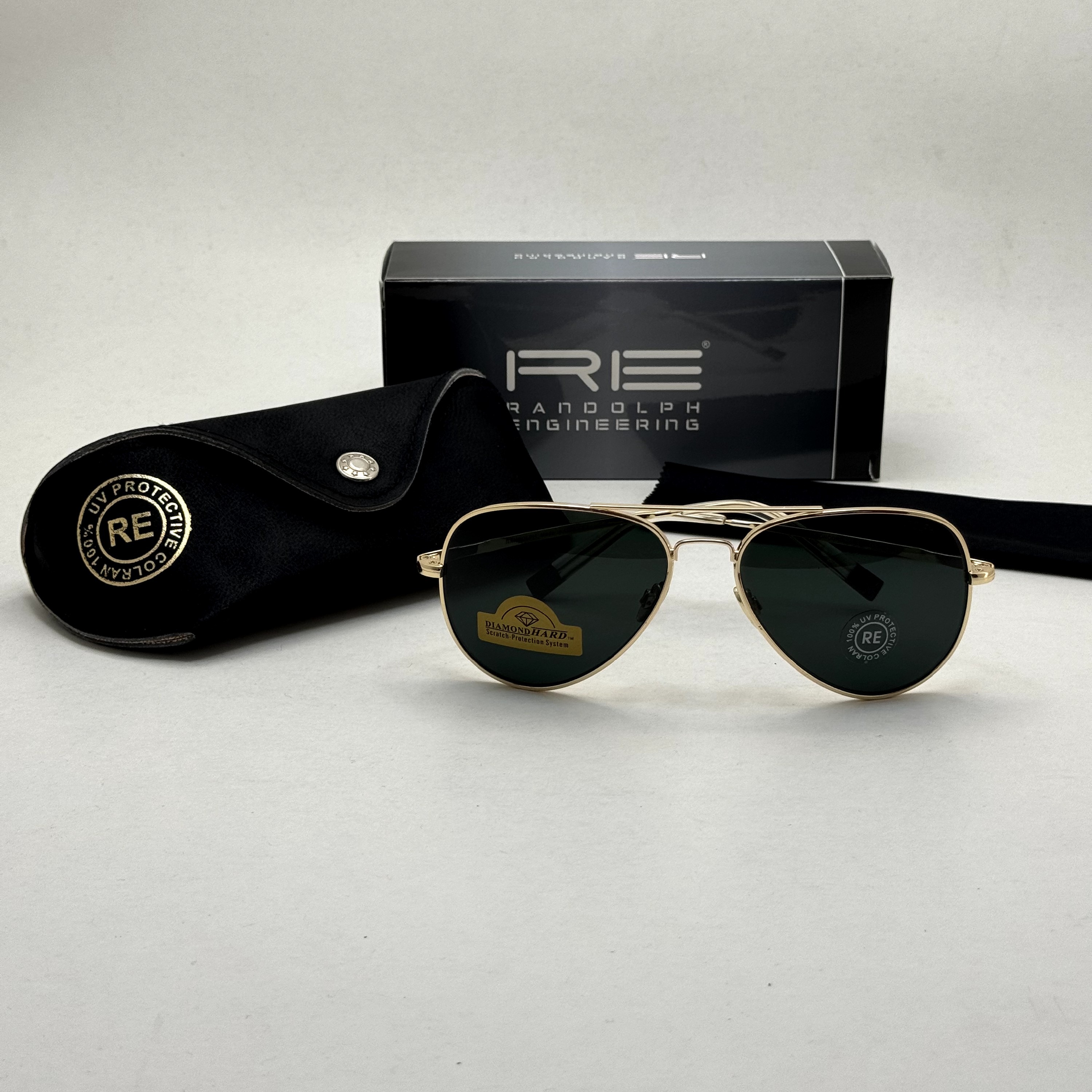 عینک آفتابی خلبانی رندولف شیشه سنگ مدل کانکورد آنتی رفلکس مشکی فریم طلایی فول پک RANDOLPH AVIATOR CR 231 24K GOLD