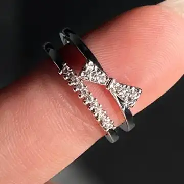 انگشتر زنانه و دخترانه جواهری طرح دولاین پاپیون ضد حساسیت رنگ ثابت فری سایز کد atk (پس کرایه)