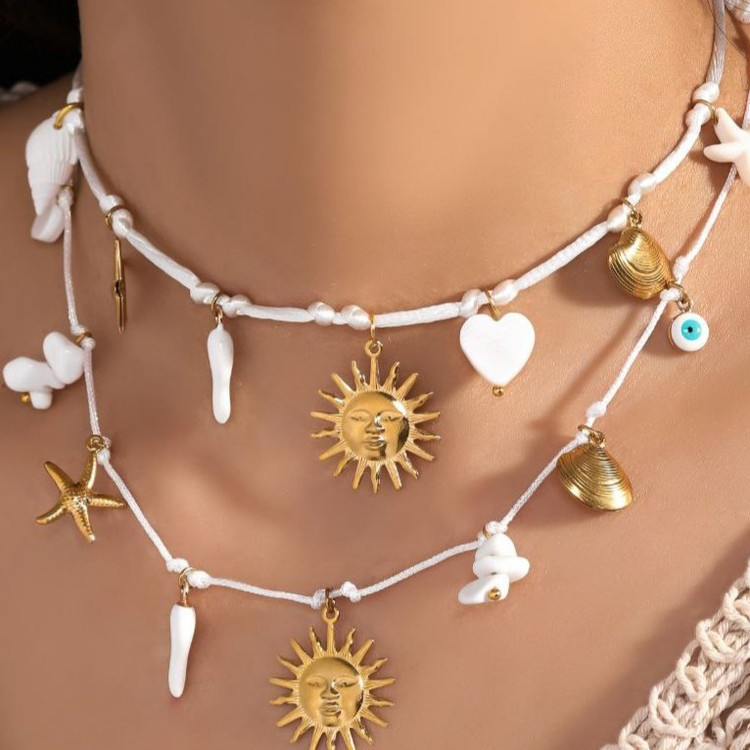 گردنبند آبکاری نقره زنانه طرح صدفو مهره با چارم های دریایی(قیمت تک) تنوع طرح رنگ ثابت کد tj (پس کرایه)
