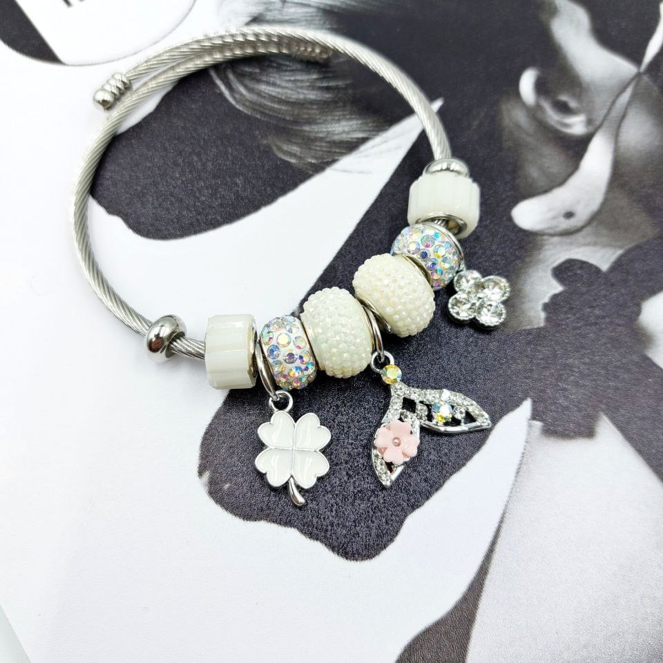 دستبند زنانه طرح پاندورا آویز دار نگین دار در تنوع و رنگبندی بالا رنگ ثابت کد mp (پس کرایه)