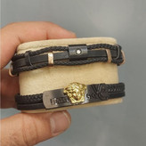 دستبند چرمی قفل و پلاک استیل مردانه کارتیر Cartier کیفیت چرم عالی تنوع طرح رنگ ثابت کد bn (پس کرایه)