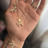 ست کامل گردنبند و دستبند و انگشتر و گوشواره زنانه طرح پاپیون نگین رنگ ثابت کد sm (پس کرایه)