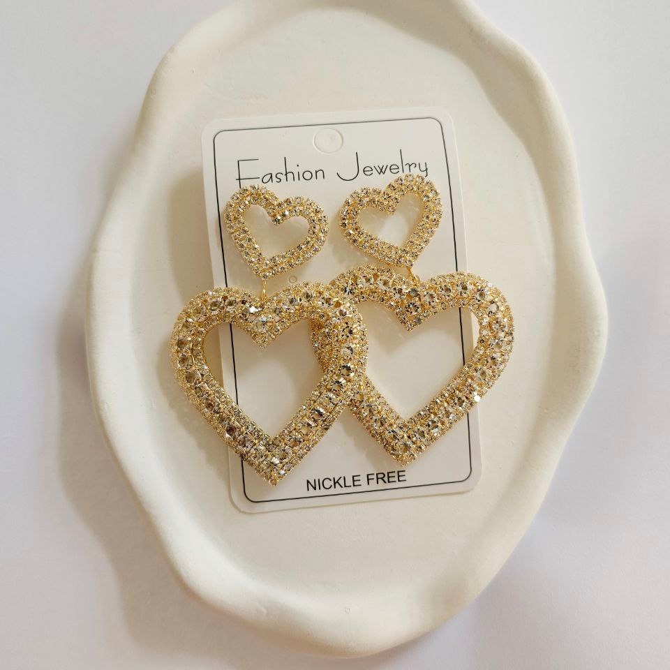 گوشواره طرح جواهری طرح قلب وسط خالی نگین تنوع طرح رنگ ثابت کد vn (پس کرایه)