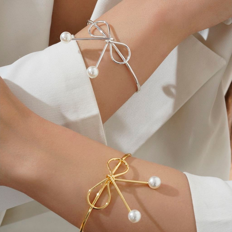 دستبند بنگل النگویی فنری طرح پاپیون و مروارید رنگ ثابت تنوع طرح کد mp