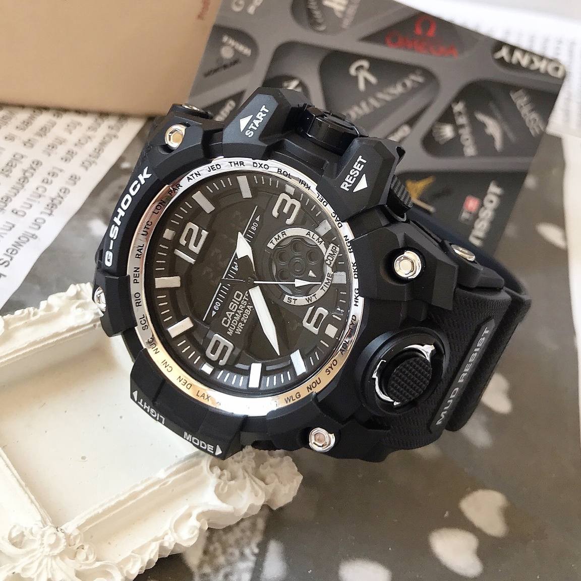 ساعت جیشاک دو زمانه های کپی حک مارک روی بدنه و قفل و بند مارکGshock کد L99270