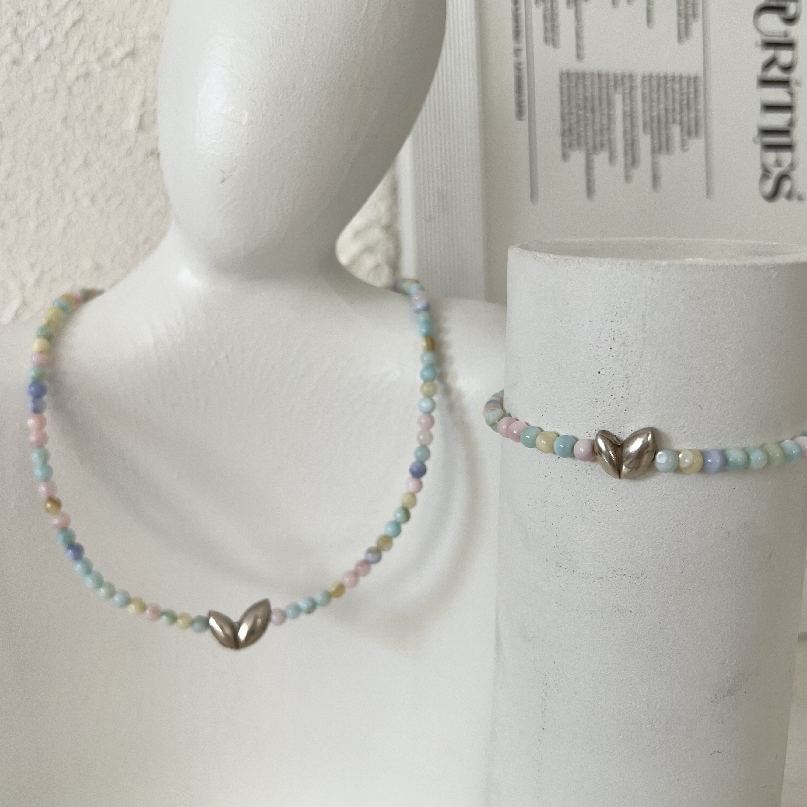 گردنبند و دستبند قلب دفرمه نقره عیار 925 با سنگ پاستیلی