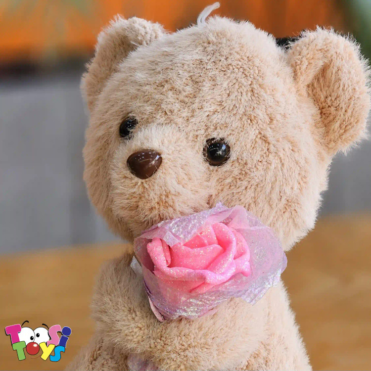 عروسک خرس اروپایی گل به دست