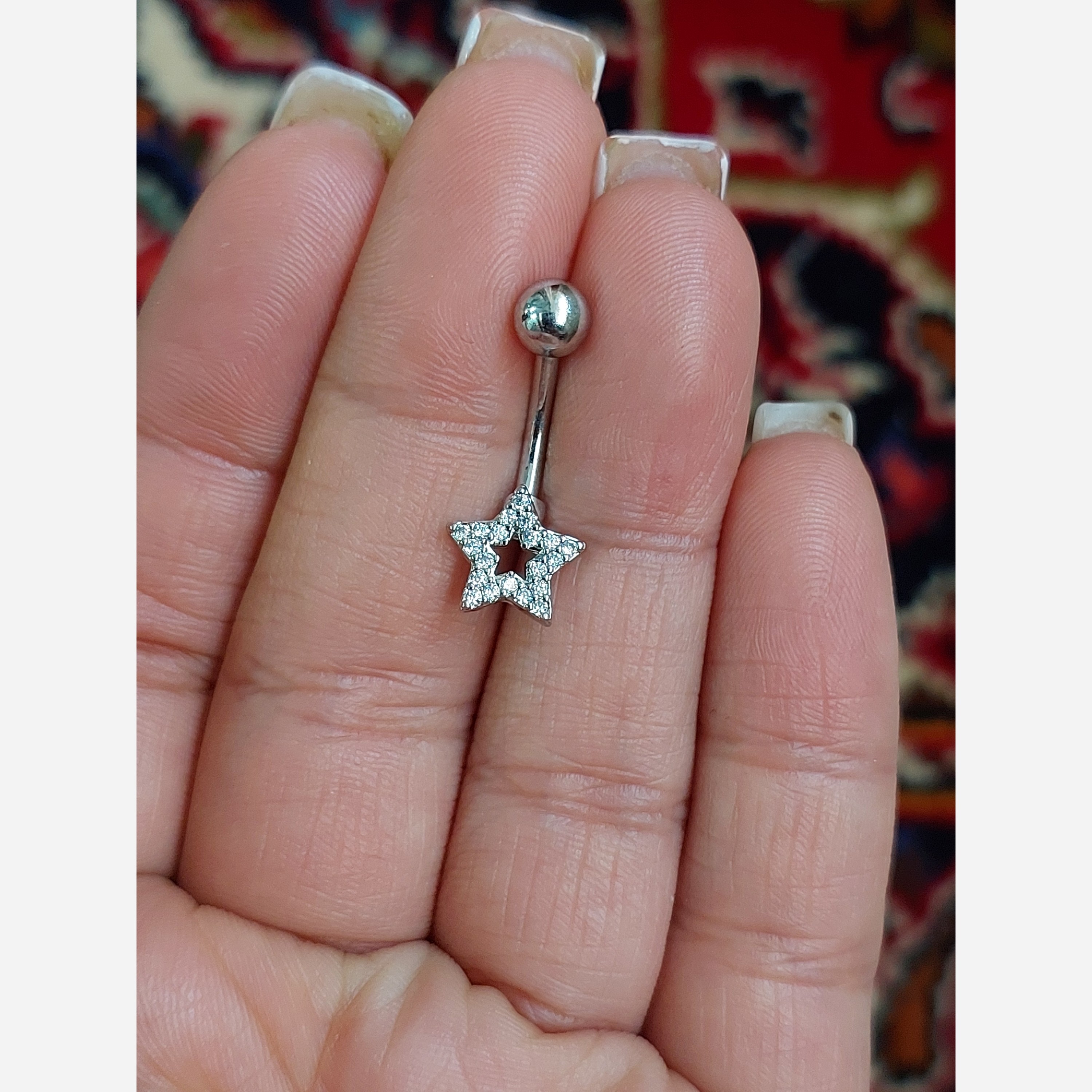 پیرسینگ ناف طرح ستاره